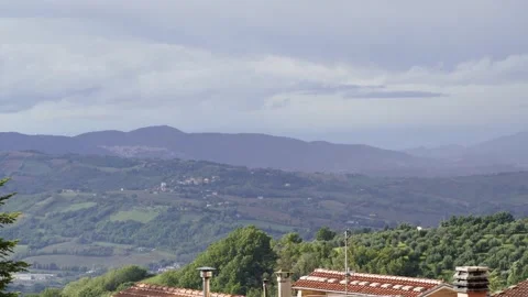 Storm clouds passing over the Marche hills Stock Footage 141204344