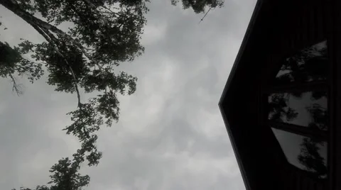 Storm Clouds Roll in over the Cabin Stock Footage 65322228