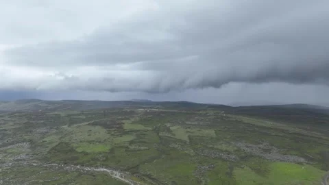 Storm Clouds Rolling Across Plateau Grassland in Sichuan, China Stock Footage 344035312