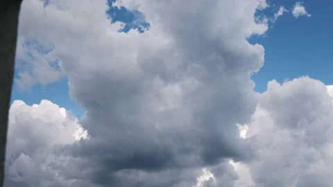 Storm Clouds Rolling in over beach front Stock Footage 212149840
