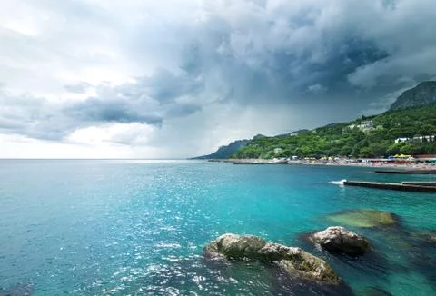 Storm clouds at sea Stock Photos