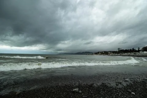 Storm clouds by the sea Stock Photos