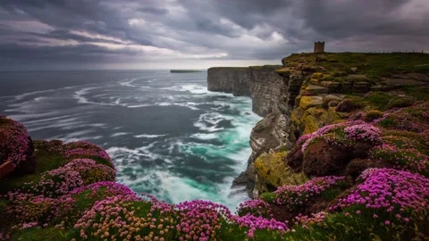 Storm Clouds with Sea Pinks from Kitchener's Memorial in Marwick Orkney HD  Stock-Footage 256084130