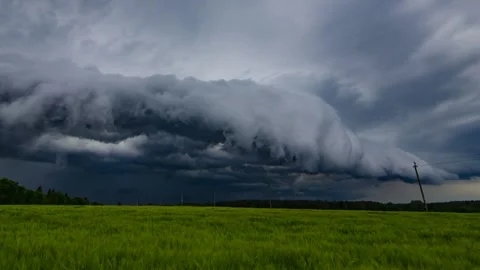 Storm Clouds, Shelf Cloud over Field Dangerous Storm Stock Footage 280039091