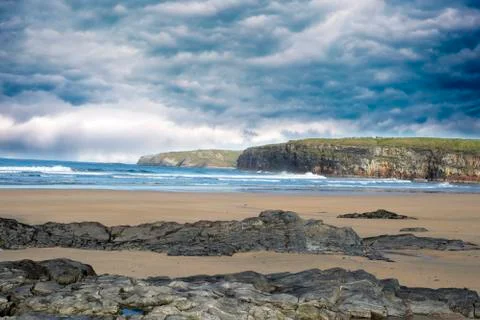 Storm clouds with soft cliff waves Stock Photos