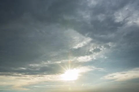 Storm clouds with sunlight Stock Photos