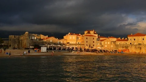 Storm clouds at sunset, above the Adriatic sea and old town, Budva Stock Footage 120978373