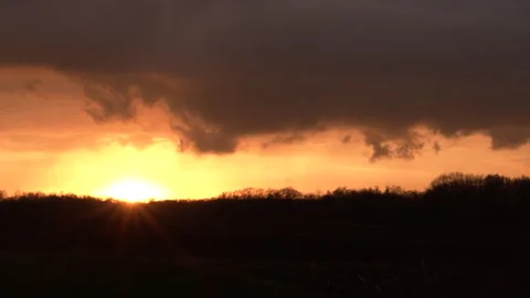 Storm clouds at sunset Stock Footage 335654371