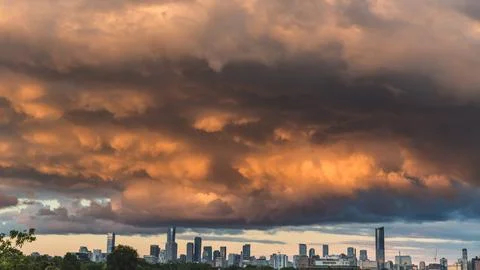 Storm clouds at sunset Stock Photos