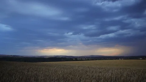 Storm is coming, cloudscape. Thunderstorm over typical rural scene. Stock Footage