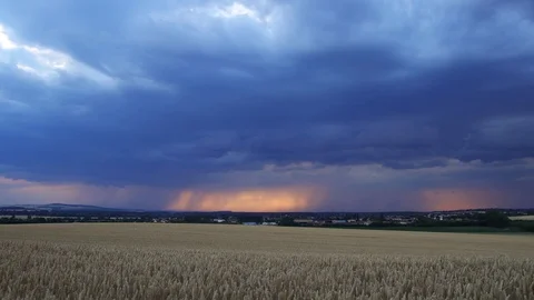 Storm is coming, cloudscape. Thunderstorm over typical rural scene. Timelapse Stock Footage 107386775