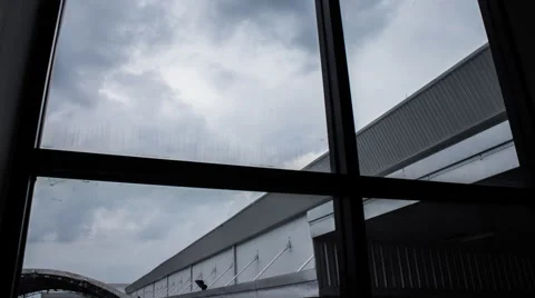 The storm is coming in the window at warehouse, timelapse Stock Footage 45390344