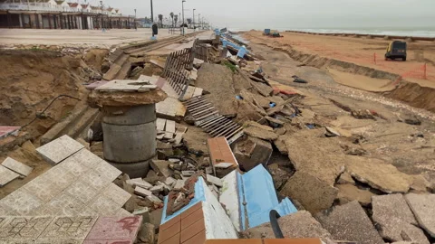 Storm damage causing erosion along the promenade in Matalascanas, Spain, with Vidéo 333038156
