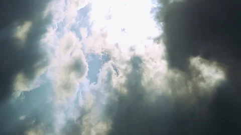 Storm dark rainy clouds moving over sun Stock Footage 91152499