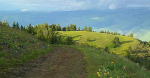 Storm dissipating over Salmon River drainage from the rim of Hells Canyon. Stock Footage 68023206