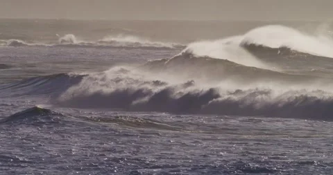 Storm driven ocean waves crashing heavy surf slow motion Stock Footage 330922209