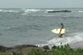 Storm Fiona - Surfers enter water Footage