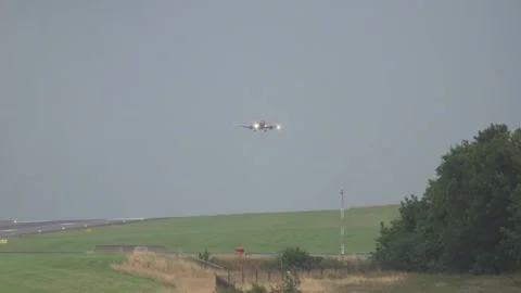 Storm Floris: Dramatic footage shows plane struggling to land Stock Footage 314269621