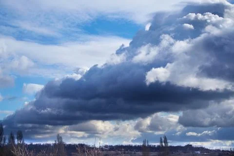 Storm front of clouds low over the ground Stock Photos