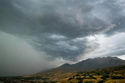 Storm front hitting Timpanogos Mountain in Utah Stock Photos