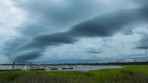 Storm front moving over coast Stock Footage 77348212