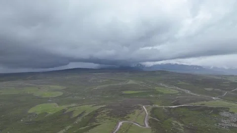 Storm Front Over Winding Plateau Road in Sichuan, China Stock Footage 344035162