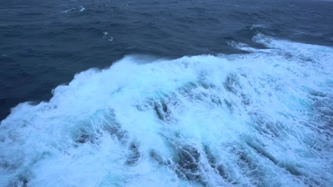 Storm. High waves. White foam on wind. Side view along ship. Wind breaks waves Stock Footage 195666471