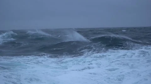 Storm. High waves. White foam on wind. Side view low on water. Wind breaks waves Stock Footage 260264739