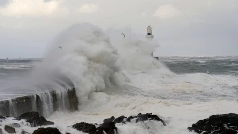 Storm hitting Aberdeen Harbour Breakwater Stock Footage