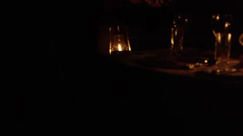 Storm Lantern Being Placed on Beautifully Laid Table Stock Footage 55660376