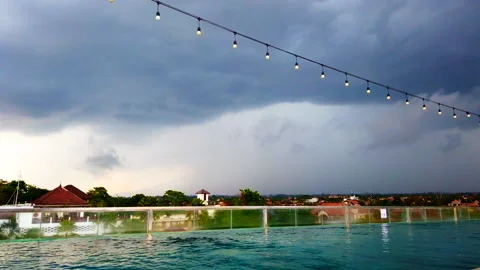 Storm with lightening on a pool after the party, Timelapse, Bali, HD Stock Footage 158599404