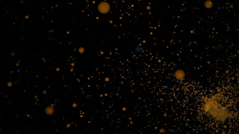 Storm of many colored dots. Design. Swarming stream of colored dots on black Stock Footage 249202672