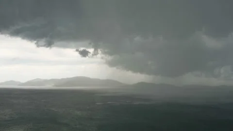 Storm moving above island. Heavy rain. Time Lapse Stock Footage 94266194