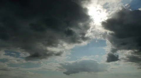 Storm moving in front of sun, Time Lapse, 4K Stock Footage 47454726