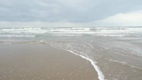 Storm in the ocean with a low tide slow motion Stock Footage 87503299