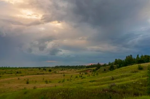 Storm over meadow Foto stock