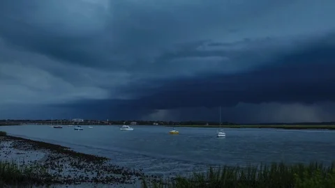 Storm over water time lapse Stock Footage 72410111