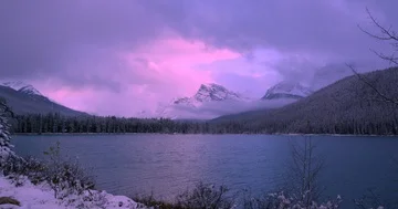 Storm passing over Saskatchewan River, Banff National Park, Alberta Stock Footage 85590793