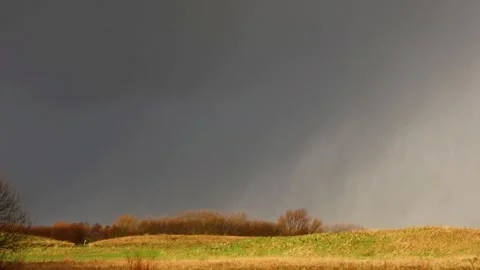A storm passing by taking various elements of bad weather to the lands Stock Footage 267281271