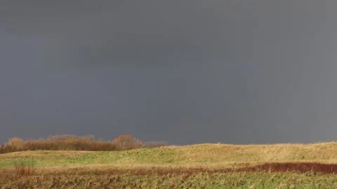 A storm passing by taking various elements of bad weather to the lands Stock Footage 267644698