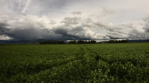 Storm passing through farm land Stock Footage 60793637