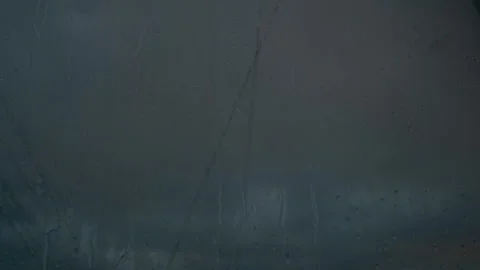 Storm rain clouds Drops rain on glass. sad weather, wire sways in wind Stock Footage 304299493