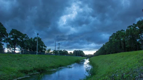 Storm Raining Over Canal Palm Beach County Florida Stockbeeldmateriaal 42847747
