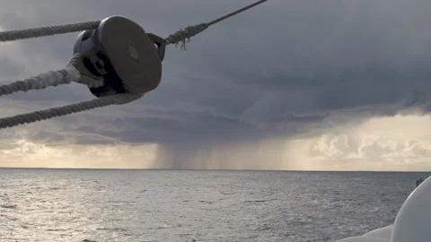 Storm rainy cloud in the open ocean on daytime Stock Footage 155150820