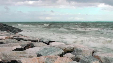 Storm rocks sea waves breakers clouds foam horizon Stock Footage 48667341