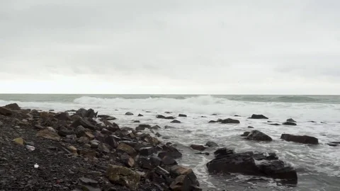 Storm sea and mountains on the horizon Stock-Footage 83210193