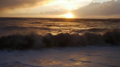 Storm in the sea, big waves crashes on the beach in sunset Vídeos de archivo 70829880