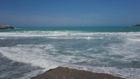 Storm on the sea. Big waves. View from the shore. Blue sky and sea. Stock Footage 108799477