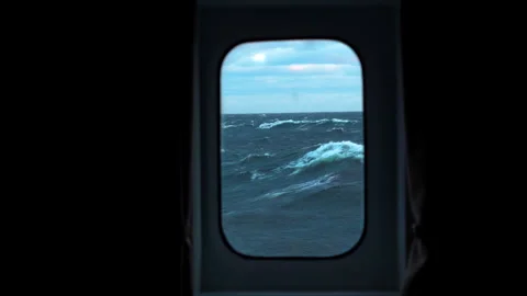 Storm. Sea. High waves with foam. View through cabin window. Strong pitching. Stock Footage 258013285