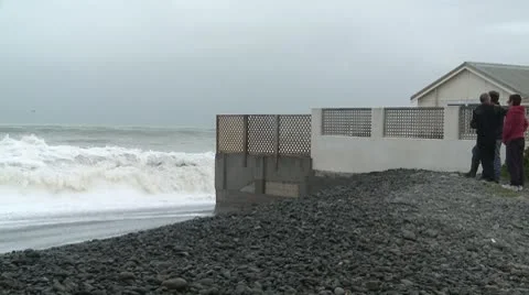 Storm sea hits sea side house Stock Footage
